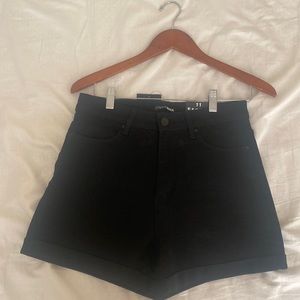 Fahion Nova. black. Sz 11, high waist shorts. Cuffed. Never worn with tags.